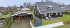 EDC Jensen & Riise: Smukt og velholdt træhus fra 2006