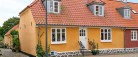 Fint byhus med allerbedste beliggenhed nær havn og strand
