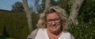 Plakat runder 100.000 kr. i overskud