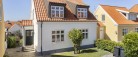 NYHED – Yderst charmerende villa med idyllisk gårdhavemiljø og hyggelig have